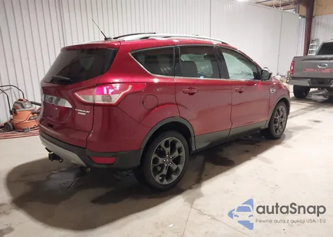 2015 Ford Escape Titanium z USA, uszkodzony, nr VIN 1FMCU9J9XFUB91359